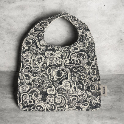 Feeder Bib - Māori inspired Koru grey