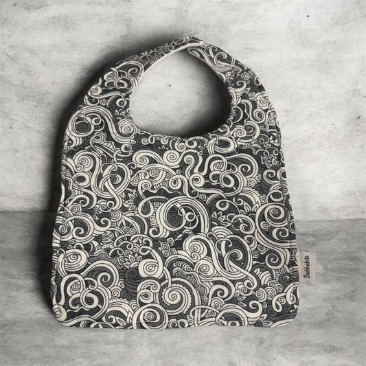 Feeder Bib - Māori inspired Koru grey